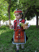 Детска носия от Никопол - Пищимал правен около 1930 г., престилка, елек, украса за глава, колан