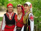 Three of our dancers, three different costumes.